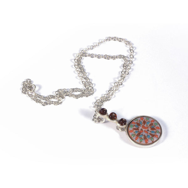 Dije de Plata con Talavera Naranja.